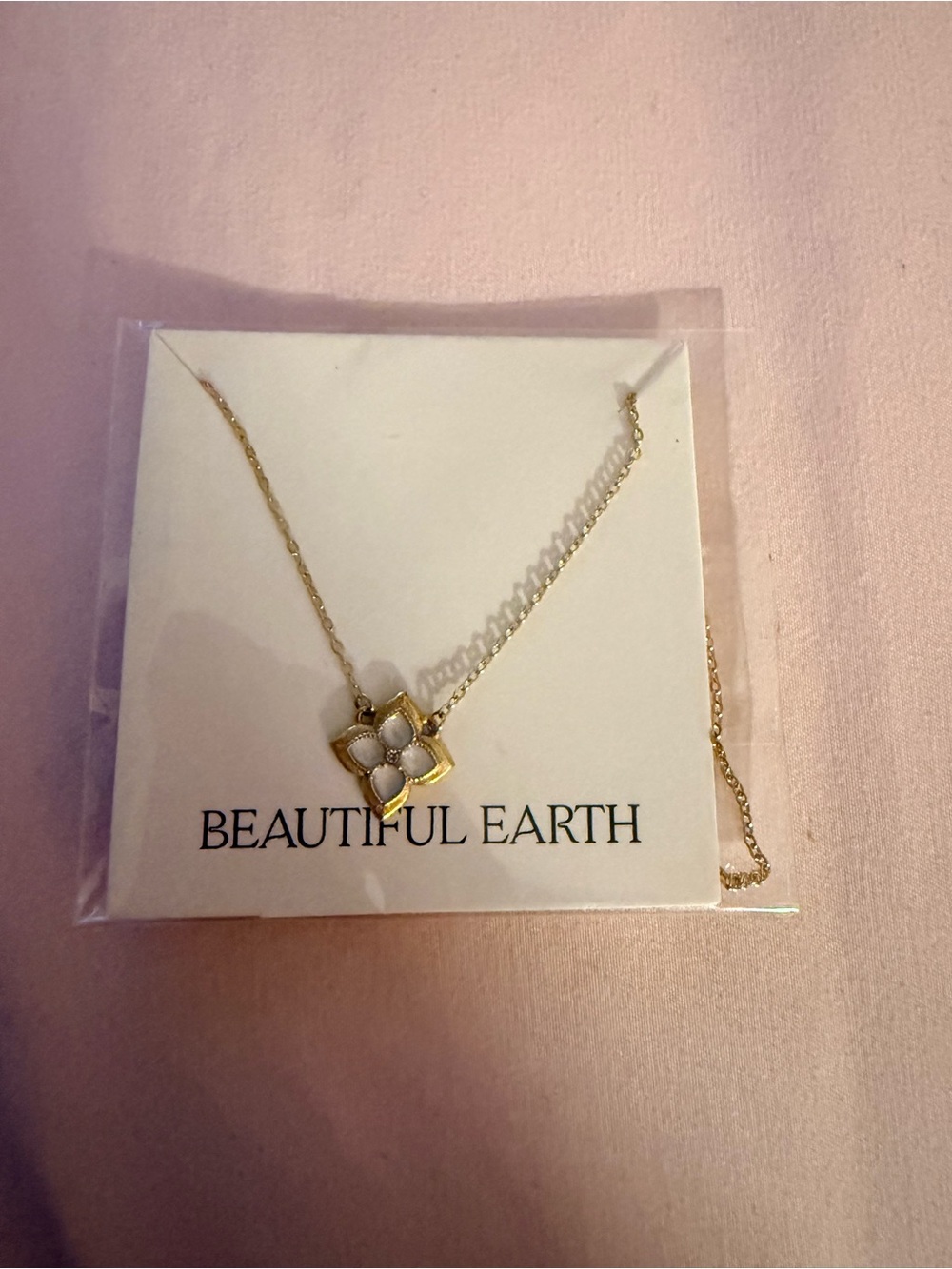 Gold Four-Petal Pendant Necklace with White Accent